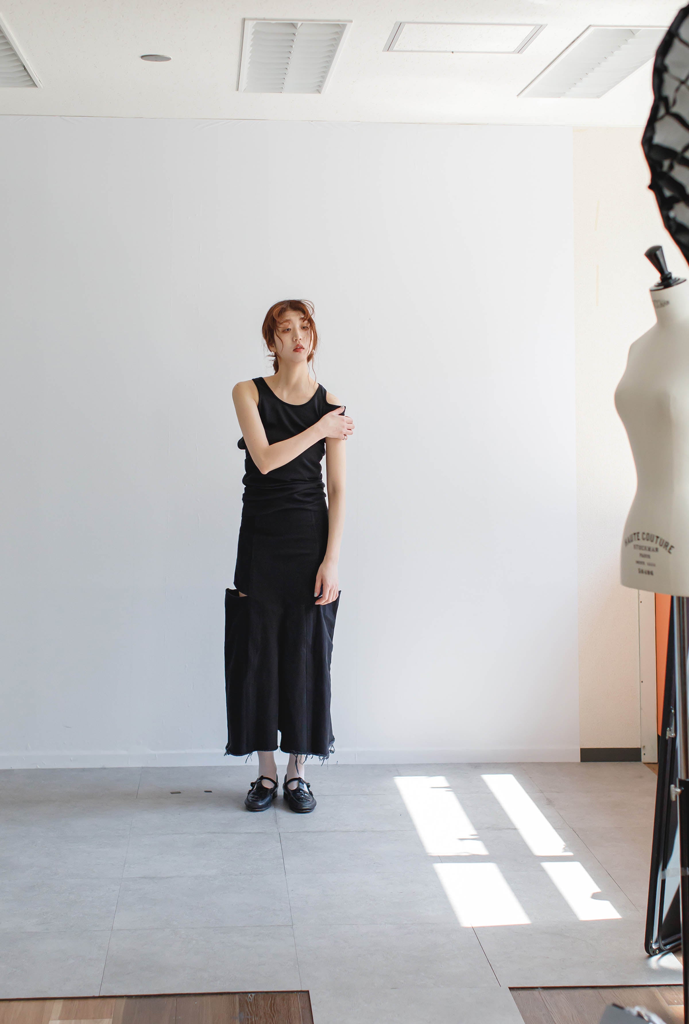 〔77circa〕circa make four cutback bias slit denim skirt